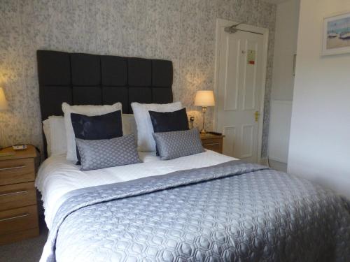 Ένα ή περισσότερα κρεβάτια σε δωμάτιο στο Bryn Derwen Guest House
