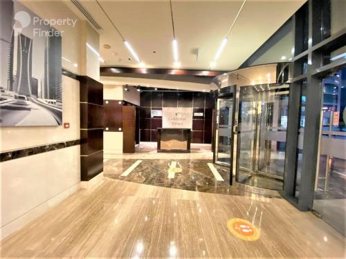 a hallway with a bowling alley in a building at Click Stay - JLT - Studio & Balcony Lakes view Entire Apartment -RA in Dubai