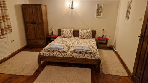Ένα ή περισσότερα κρεβάτια σε δωμάτιο στο Melnik Pyramids Guesthouse