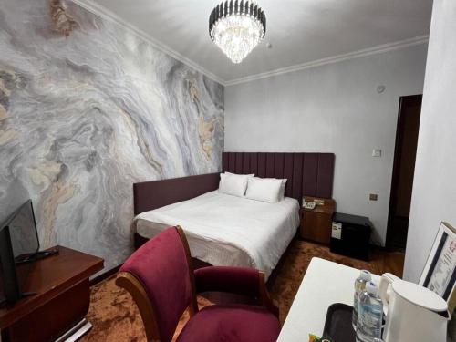 Ένα ή περισσότερα κρεβάτια σε δωμάτιο στο Luxurious