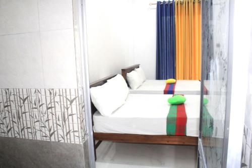 Postel nebo postele na pokoji v ubytování Sigiriya Mana B&B