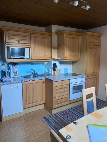 Kuchyň nebo kuchyňský kout v ubytování Haus Holaus Helga