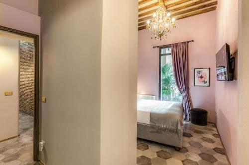 Residenza Brama - Art ApartHotelにあるベッド