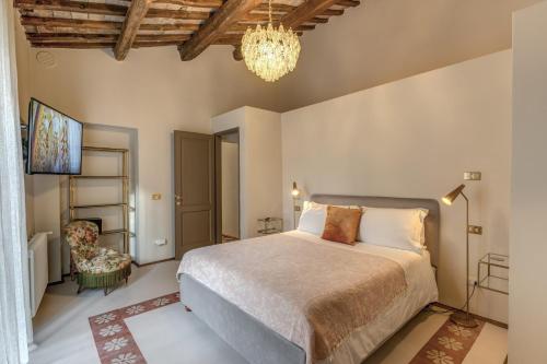 Residenza Brama - Art ApartHotelにあるベッド