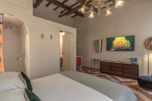 Residenza Brama - Art ApartHotelにあるベッド
