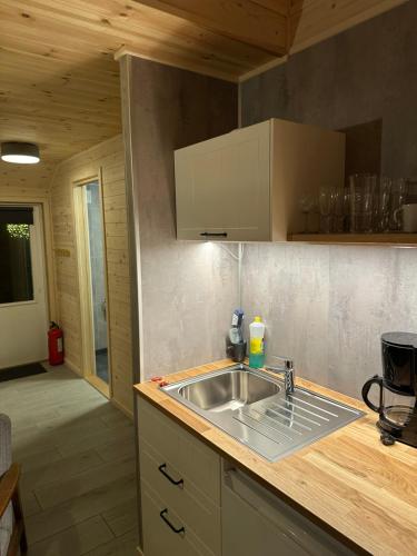 Kuchyň nebo kuchyňský kout v ubytování Haugo Utleige Lodge