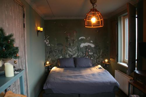 Postel nebo postele na pokoji v ubytování B&B Het kasteel