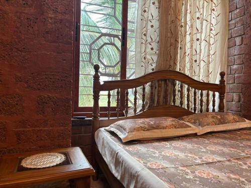 Postel nebo postele na pokoji v ubytování Madhushilp farmstay
