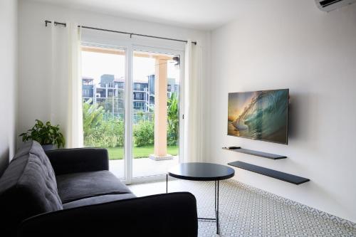 TV a/nebo společenská místnost v ubytování Homz Venao