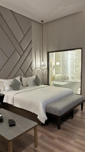 Posteľ alebo postele v izbe v ubytovaní Sudfa Hotel