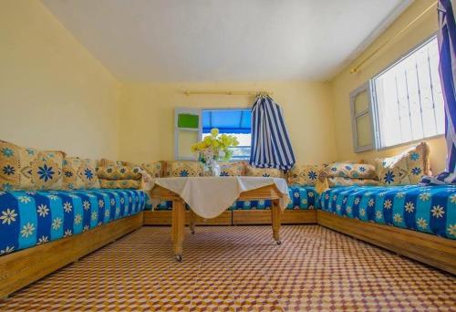 Postel nebo postele na pokoji v ubytování L île de caroubier