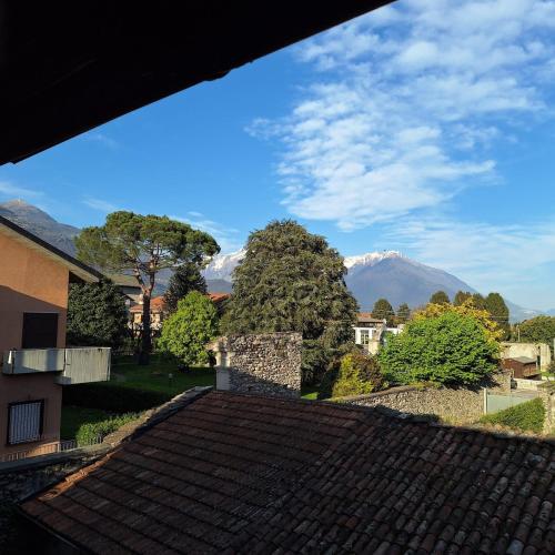 a view from the roof of a house with mountains in the background at Villa Viva-Como in Domaso