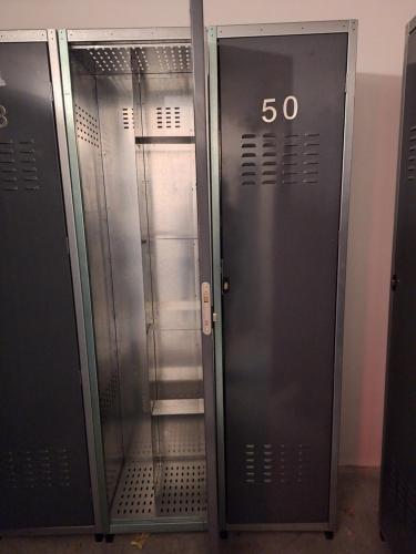 a pair of elevator doors with the number on them at EscarraSuite in Escarrilla