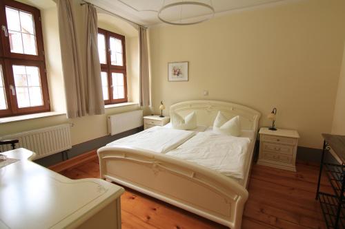 Ένα ή περισσότερα κρεβάτια σε δωμάτιο στο Hotel Zum Klötzelmönch