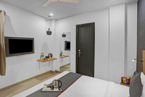 TV a/nebo společenská místnost v ubytování Townhouse Nangal Raya Pankha Road
