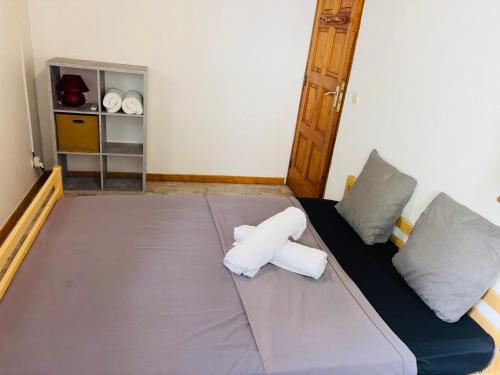 Postel nebo postele na pokoji v ubytování T2 confortable à Acajou Lamentin
