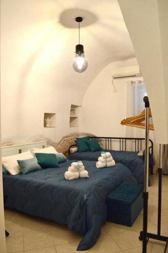 Ένα ή περισσότερα κρεβάτια σε δωμάτιο στο Casa DàStella