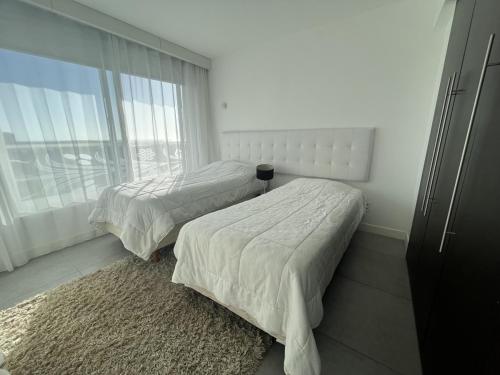 Ένα ή περισσότερα κρεβάτια σε δωμάτιο στο Yoo Punta Del Este