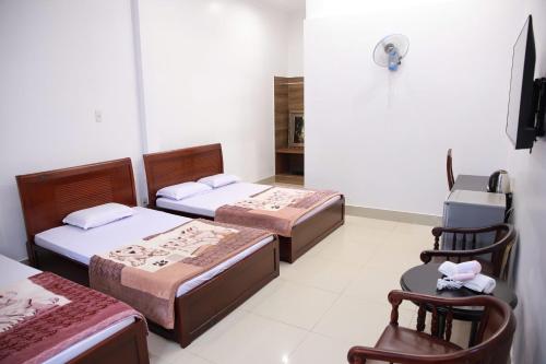 Katil atau katil-katil dalam bilik di Khách sạn Bảo Lộc Garden