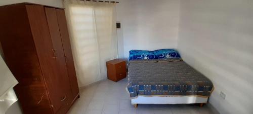 Postel nebo postele na pokoji v ubytování Departamento Trapalco