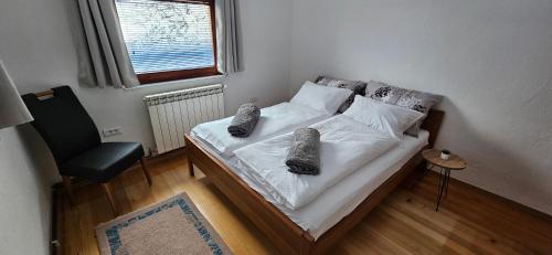 Ένα ή περισσότερα κρεβάτια σε δωμάτιο στο Apartman Alma