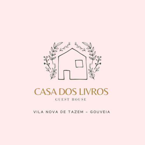 a logo for a casa dos livos guest house at Casa dos Livros - Guest House in Vila Nova de Tazem