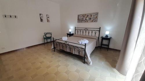 Postel nebo postele na pokoji v ubytování Pianofilecciarooms