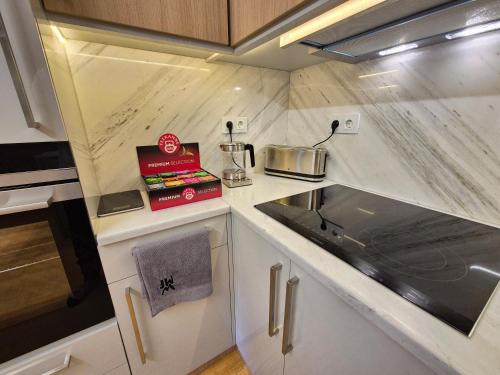 Una cocina o cocineta en The VERTEX