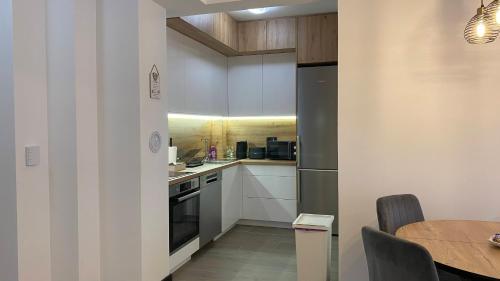 AAvenue Homeにあるキッチンまたは簡易キッチン