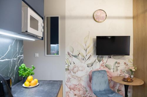 miniSTUDIOS URSUS by VAYA STAYSにあるテレビまたはエンターテインメントセンター