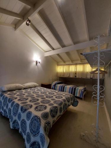 Giường trong phòng chung tại Departamento bonito y práctico!