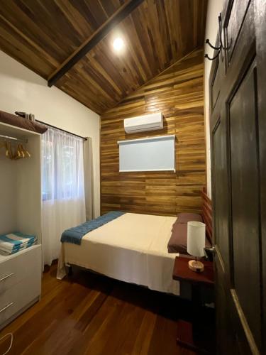 Postel nebo postele na pokoji v ubytování Casa Cooper