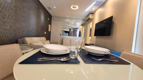 TV a/nebo společenská místnost v ubytování Unique 2304 - Vista Linda para o Mar