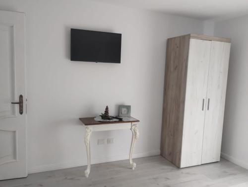 TV/Unterhaltungsangebot in der Unterkunft Casa Mont Blanc Cavnic apartament 2