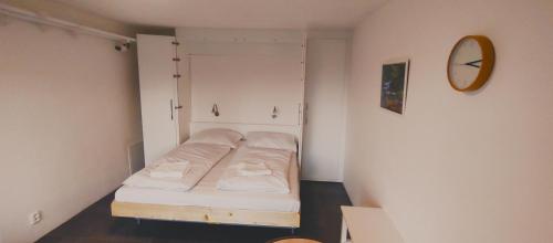 Apartmány Pěkná 10にあるベッド