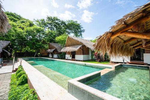 Bazén v ubytování LA QUEBRADA ECO LODGE Hotel Boutique nebo v jeho okolí