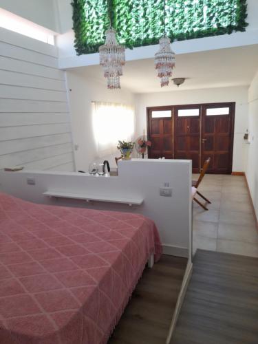 Postel nebo postele na pokoji v ubytování La Ola Zen