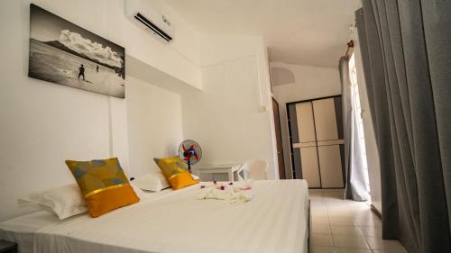 Postel nebo postele na pokoji v ubytování La Plage Residence