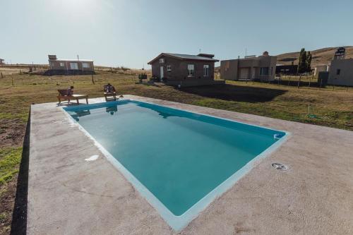 Piscina en o cerca de Casa con pileta en barrio Pillahuinco
