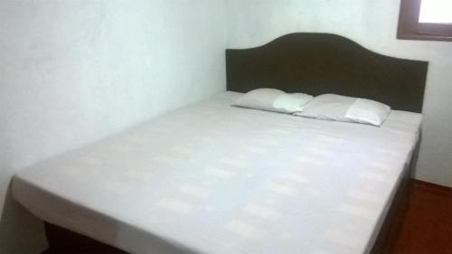 Łóżko lub łóżka w pokoju w obiekcie Fort Sea View Hotel