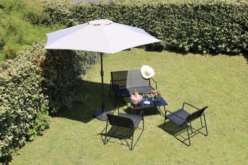 Κήπος έξω από το Charmant appartement au Cap Ferret vue bassin d Arcachon