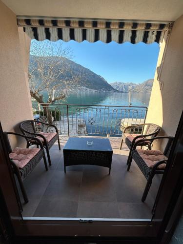 a view of a balcony with a view of a lake at Apartments Dijana in Kotor