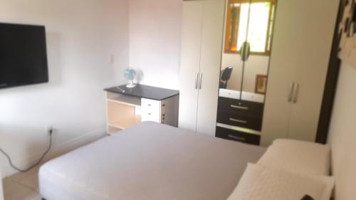 Postel nebo postele na pokoji v ubytování Alugo quarto com internet