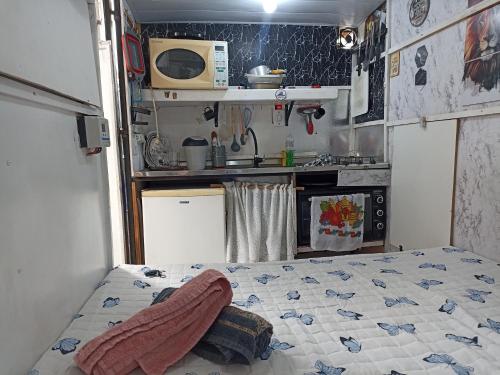 Dapur atau dapur kecil di Trailer HOME do Refúgio