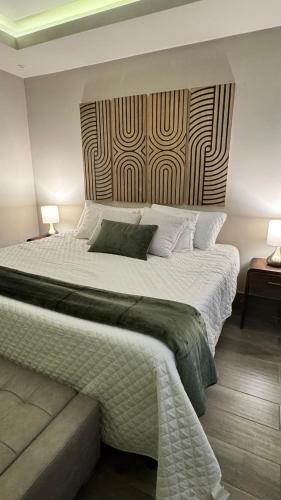 Ένα ή περισσότερα κρεβάτια σε δωμάτιο στο Suite en exclusivo residencial privado