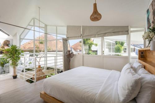 Katil atau katil-katil dalam bilik di Tiny Homes, Sanur