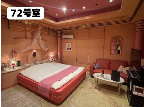 Postel nebo postele na pokoji v ubytování 大人専用ホテルイエスタディ