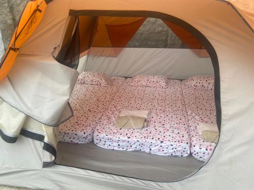 Ένα ή περισσότερα κρεβάτια σε δωμάτιο στο Camping Casa Nordica