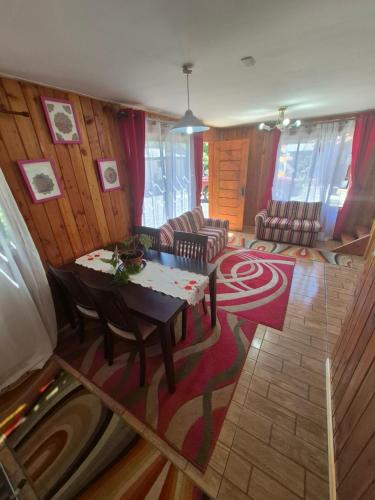 Posezení v ubytování Cabañas Alfa-lihue