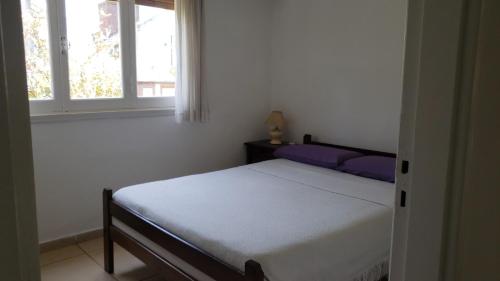 En eller flere senge i et værelse på Casa Los Tilos Ostende